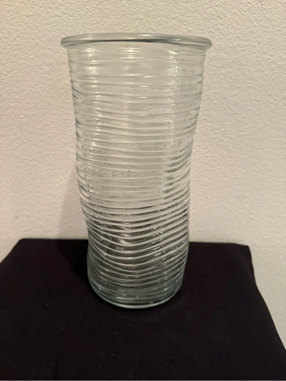 Ribbed glass vase, wavy, pinched shape. Mid-Century Modern design. 9.75”